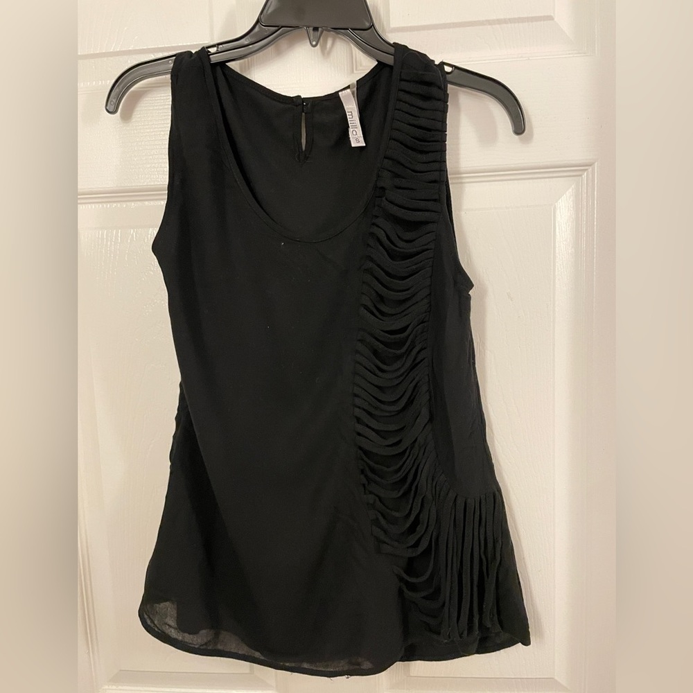 Black top with fringes. Size small.
